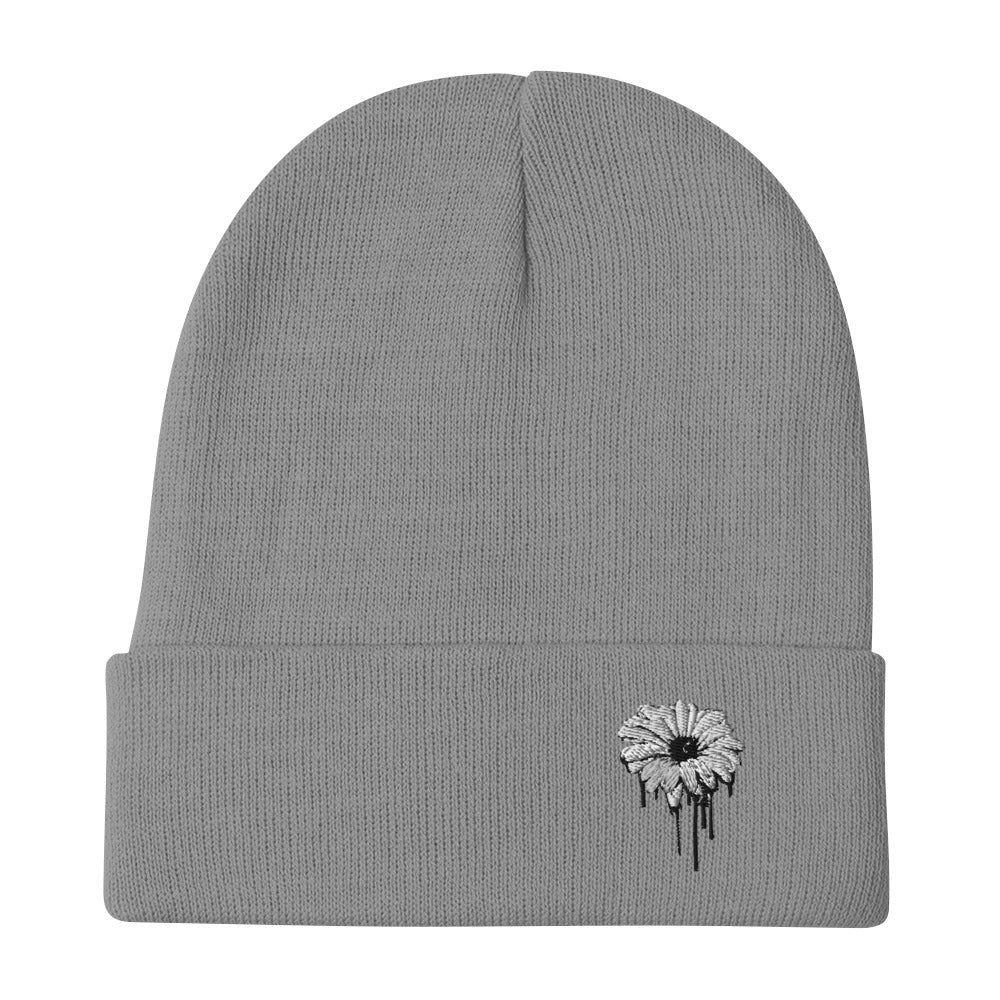Gray knit beanie with daisy dripping